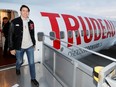 Liberal leader and Canadian Prime Minister Justin Trudeau looks on as he boards the plane at the airport in Vancouver, British Columbia, Canada October 12, 2019.