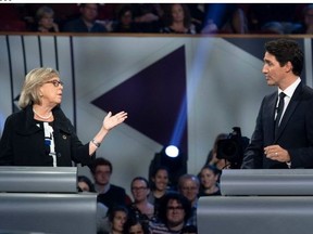 Green Party Leader Elizabeth May (L) and Liberal Leader Justin Trudeau square off during the Oct. 7, 2019 leaders debate. (Photo by JUSTIN TANG/POOL/AFP via Getty Images)