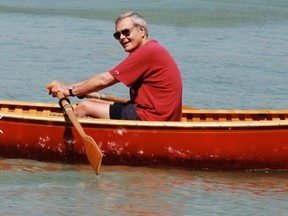 Tom MacMillan is pictured in his beloved row boat.