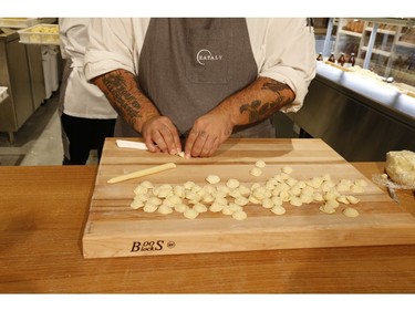 Making handmade pasta at the preview for the grand opening of 55,000 square foot Eataly Toronto grocery store - the first in Canada - is set to open in the Manulife Centre on November 13. on Wednesday October 30, 2019. Jack Boland/Toronto Sun/Postmedia Network