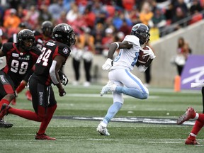 Argonauts wide receiver Armanti Edwards runs with the ball against Ottawa Redblacks in September. Edwards needs 48 yards to join Derel Walker and S.J. Green as Argos receivers to reach 1,000 yards this season. The last time the Boatmen had three receivers reach the milestone was 2005, when Arland Bruce, Tony Miles and Robert Baker turned the trick. (THE CANADIAN PRESS FILES)