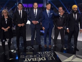 Federal party leaders Green Party leader Elizabeth May, Liberal leader Justin Trudeau, Conservative leader Andrew Scheer, People's Party of Canada leader Maxime Bernier, Bloc Quebecois leader Yves-Francois Blanchet and NDP leader Jagmeet Singh pose for a photograph before the Federal leaders debate in Gatineau, Que. on Monday, October 7, 2019.
