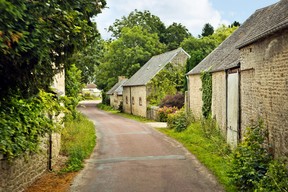 Normandy’s little lanes, cute stone houses, and lush greenery are irresistible. (Dominic Arizona Bonuccelli)