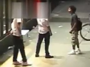 Video frame of a suspect wanted in a July stabbing of a man near Queen and Spadina