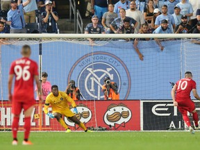 TFC’s Alejandro Pozuelo scores a goal on a penalty kick against New York City FC’s Sean Johnson at Yankee Stadium in September. The teams will play at Citi Field on Wednesday night. (USA TODAY SPORTS)