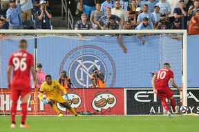 TFC’s Alejandro Pozuelo scores a goal on a penalty kick against New York City FC’s Sean Johnson at Yankee Stadium in September. The teams will play at Citi Field on Wednesday night. (USA TODAY SPORTS)