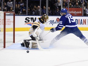 Bruins goaltender Jaroslav Halak turns away Maple Leafs’ Alexander Kerfoot on Saturday night in Toronto. (USA TODAY SPORTS)