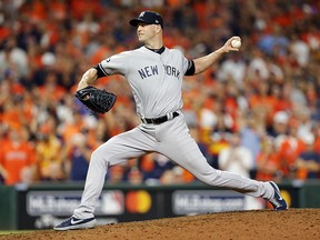 J.A. Happ of the New York Yankees pitches against the Houston Astros in Game 2 of the American League Championship Series at Minute Maid Park on October 13, 2019 in Houston. (Bob Levey/Getty Images)