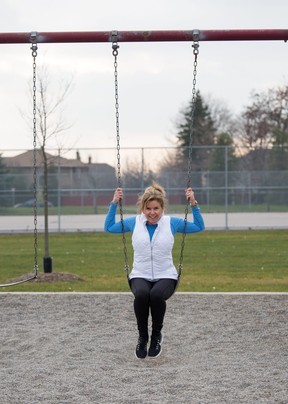 Janet Omstead uses a swing to enjoy the dark days of winter.