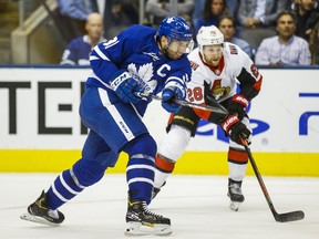 Maple Leafs captain John Tavares shoots during the season-opener against the Ottawa Senators on Wednesday night at the Scotiabank Arena. (Ernest Doroszuk/Toronto Sun)