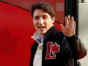 Liberal leader Justin Trudeau arrives to visit a farm during an election campaign visit to Manotick, Ont., near Ottawa, on Thursday, Oct. 10, 2019.