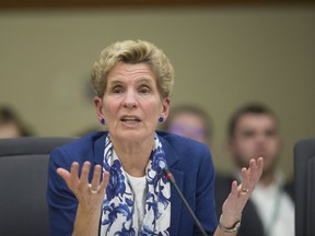 Former Ontario Premier Kathleen Wynne defends her decisions as Premier at Queens' Park, in Toronto, Ont. on Monday, Dec. 3, 2018. (Stan Behal/Toronto Sun/Postmedia Network)