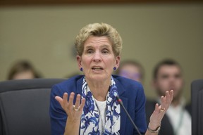 Former Ontario Premier Kathleen Wynne defends her decisions as Premier at Queens’ Park, in Toronto, Ont. on Monday, Dec. 3, 2018. (Stan Behal/Toronto Sun/Postmedia Network)