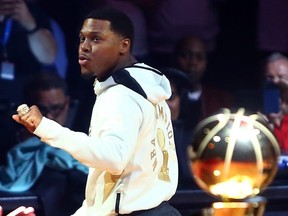 Kyle Lowry shows off his Raptors championship ring on Tuesday. GETTY IMAGES