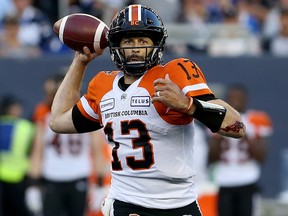 B.C. Lions quarterback Mike Reilly rolls out to throw during CFL action against the Blue Bombers in Winnipeg on Thurs., Aug. 15, 2019. (Kevin King/Winnipeg Sun)