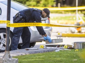 Toronto Police at the scene of a homicide from the previous evening at 4005 Don Mills Rd. in Toronto, Ont. on Friday October 18, 2019.