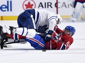 Maple Leafs defenceman Jake Muzzin (top) collides with Montreal Canadiens forward Artturi Lehkonen at the Bell Centre. on Saturday night. The Leafs need this kind of physicality from players besides Muzzin. (Eric Bolte/USA TODAY Sports)