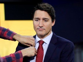 Liberal leader and Canadian Prime Minister Justin Trudeau attends a television interview in Toronto on Oct. 9