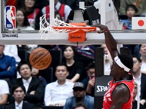 Raptors’ Pascal Siakam dunks during pre-season action against the Houston Rockets in  Tokyo on Thursday. Siakam is expected to be Toronto’s top scoring option this season. (GETTY IMAGES)