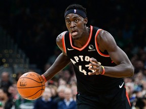 Pascal Siakam dribbles the ball up court in the first half against the Boston Celtics at TD Garden on Oct. 25, 2019 in Boston, Mass. (Kathryn Riley/Getty Images)