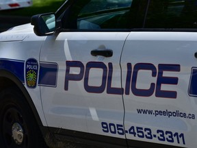 File photo of a Peel Regional Police vehicle at a crime scene. (Bryan Passifiume/Toronto Sun/Postmedia Network)
