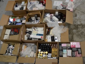 Perfume that South Simcoe Police say was recovered from a Toronto condo. A couple is charged with theft.