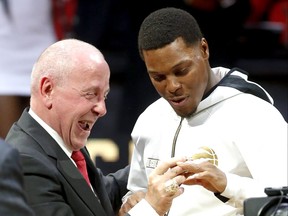 Toronto Raptors Kyle Lowry gets his ring from Larry Tannebaum  at the  ring ceremony and banner raising for their championship season before the game in Toronto, Ont. on Tuesday October 22, 2019. Jack Boland/Toronto Sun/Postmedia Network