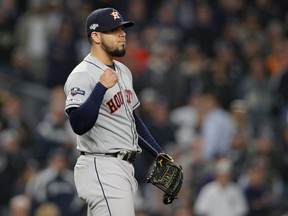 Astros pitcher Roberto Osuna reacts after defeating the Yankees in Game 3 of the 2019 ALCS at Yankee Stadium in New York City, on Oct. 15, 2019.