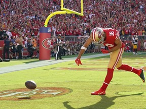 Dante Pettis of the San Francisco 49ers celebrates by slamming the ball to the turf after he caught a touchdown pass against the Pittsburgh Steelers late in the fourth quarter at Levi's Stadium on Sept. 22, 2019 in Santa Clara, Calif.  (Thearon W. Henderson/Getty Images)