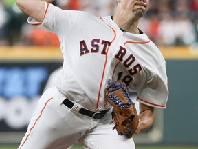 Houston Astros pitcher Aaron Sanchez had surgery to repair a torn capsule on his right shoulder in mid-September. (Bob Levey/Getty Images)
