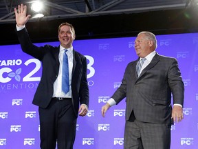 Andrew Scheer is congratulated by Ontario Premier Doug Ford at the Ontario PC Convention 2018 at the Toronto Congress Centre on Saturday, November 17, 2018. (Jack Boland/Toronto Sun)