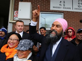 New Democratic Party leader Jagmeet Singh gestures during an election campaign visit stop at Crescent Town Elementary School in Toronto, October 17, 2019. (REUTERS/Chris Helgren)