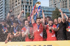 The Toronto Wolfpack celebrates its 2019 Betfred Championship grand final victory at Lamport Stadium. The Wolfpack advances to Super League after defeating the Featherstone Rovers 24-6 in Toronto on Saturday, October 5, 2019. Mathew Tsang photo