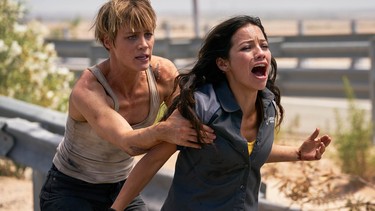 Natalia Reyes, right, and Mackenzie Davis star in Skydance Productions and Paramount Pictures' TERMINATOR: DARK FATE.