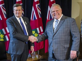Toronto Mayor John Tory (left) visits Ontario Premier Doug Ford at his office at Queen's Park in Toronto December 6, 2018. Ernest Doroszuk/Toronto Sun