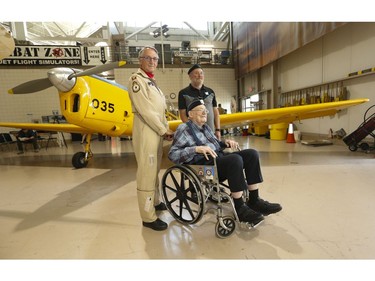 Gordon Helm, 84, a former Canadian fighter pilot in the 1950s, who flew F-86 Sabre from Baden-Soellingen during the Cold War got back up in the air in a de Havilland Chipmunk training plane. Helm pictured with his son Murray (R) and pilot Steve Purton (L)  took part of the National Seniors Day and put on by Chartwell Retirement Residences and their partner charity Wish of a Lifetime Canada. They flew out of the Canadian Warplane Heritage Museum  on Tuesday October 1, 2019. Jack Boland/Toronto Sun/Postmedia Network