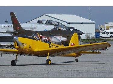 Gordon Helm, 84, a former Canadian fighter pilot in the 1950s, who flew F-86 Sabre from Baden-Soellingen during the Cold War got back up in the air in a de Havilland Chipmunk training plane. After their flight helm and pilot Steve Purton  pass by a Sabre (in the background). Helm took part of the National Seniors Day and put on by Chartwell Retirement Residences and their partner charity Wish of a Lifetime Canada. They flew out of the Canadian Warplane Heritage Museum  on Tuesday October 1, 2019. Jack Boland/Toronto Sun/Postmedia Network