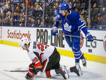 Ottawa Senators Erik Brannstrom appears to be bleeding from his after colliding with Toronto Maple Leafs Auston Matthews  during 3rd period NHL hockey action during the home opener at the Scotiabank Arena in Toronto on Wednesday October 2, 2019. Ernest Doroszuk/Toronto Sun/Postmedia