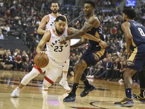 Fred VanVleet drives around Pelicans guard Nickeil Alexander-Walker on Tuesday. VanVleet rolled an ankle (again) while inadvertently stepping on a sideline photographer and may miss tonight’s game in Boston.  Veronica Henri/Toronto Sun