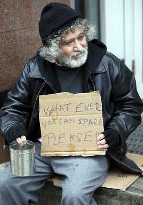 Peter Anthony experiences what it is like to be a panhandler on Yonge St., in Toronto on Wednesday, October 30, 2019. Veronica Henri/Toronto Sun/Postmedia Network