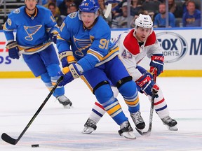 Vladimir Tarasenko of the St. Louis Blues moves the puck up ice against Jordan Weal of the Montreal Canadiens at Enterprise Center on Oct. 19, 2019 in St. Louis, Miss. (Dilip Vishwanat/Getty Images)
