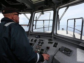 The Cape Vincent pilot boat is navigated towards two freighters that will receive new pilots to guide them through the Lake Ontario portion of their St. Lawrence Seaway journey April 23, 2019. Meghan Balogh/Postmedia Network