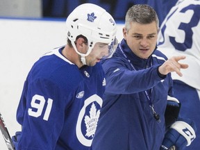 Sheldon Keefe and John Tavares talk at Toronto Maple Leaf practice at the Ford Performance Centre in Toronto on Monday November 25, 2019. Craig Robertson/Toronto Sun