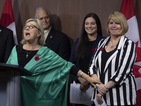 Elizabeth May announces Jo-Ann Roberts as the interim party leader during a news conference in Ottawa, Monday November 4, 2019. May announced she is stepping down as the party leader. THE CANADIAN PRESS/Adrian Wyld