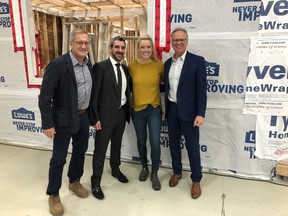 HGTV star Kate Campbell poses with, from left, RESCON’s Richard Lyall, Ontario Minister of Colleges and Universities Ross Romano and Durham College president Don Loviso at the college’s second annual conference, Expand the Possibilities: Young Women in Science, Technology and Trades. PHOTO:  Durham College