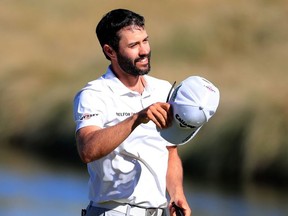 Adam Hadwin of Canada reacts after putting on the 18th green during the final round of the Shriners Hospitals for Children Open at TPC Summerlin on October 6, 2019 in Las Vegas, Nevada.