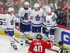 Toronto Maple Leafs centre William Nylander (88) celebrates with teammates Monday night after scoring against the Chicago Blackhawks during the third period at United Center. (Kamil Krzaczynski-USA TODAY)