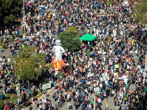 People take part in a climate change strike in Toronto on Sept. 27, 2019. (Reuters)