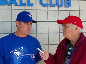 Ken Fidlin, here interviewing former Blue Jays manager John Farrell, covered the Blue Jays and baseball “without flash or bombast” as he puts it, but with a passion for the sport and its nuances with the ability to both enlighten and entertain.