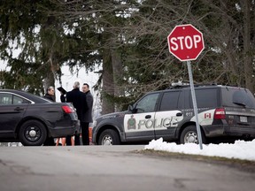 Niagara Regional Police, OPP and the SIU attend a scene near Effingham Street and Roland Road in Pelham, Ont., where a Niagara Regional Police officer was shot by a fellow officer, Nov. 29, 2018. THE CANADIAN PRESS/Aaron Lynett